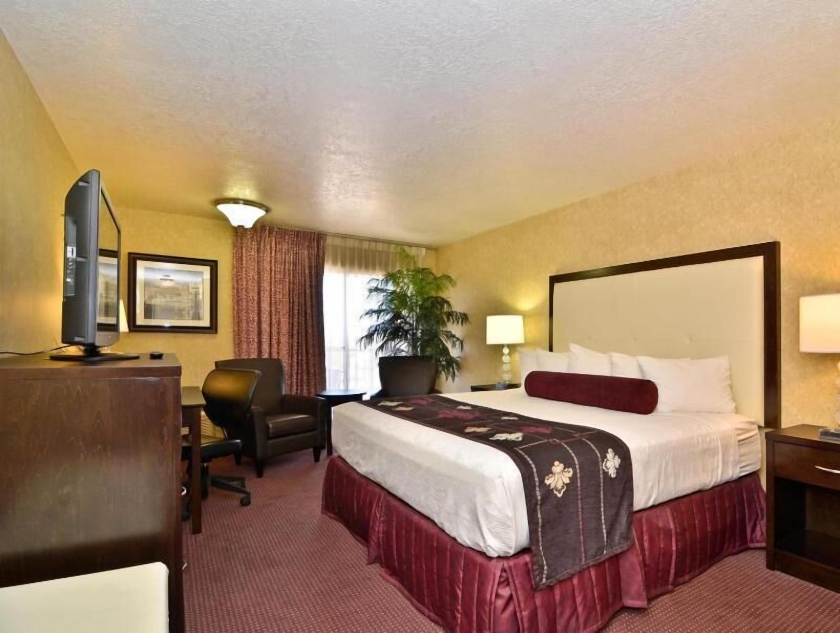 Pillowtop beds, desk, blackout drapes, iron/ironing board
