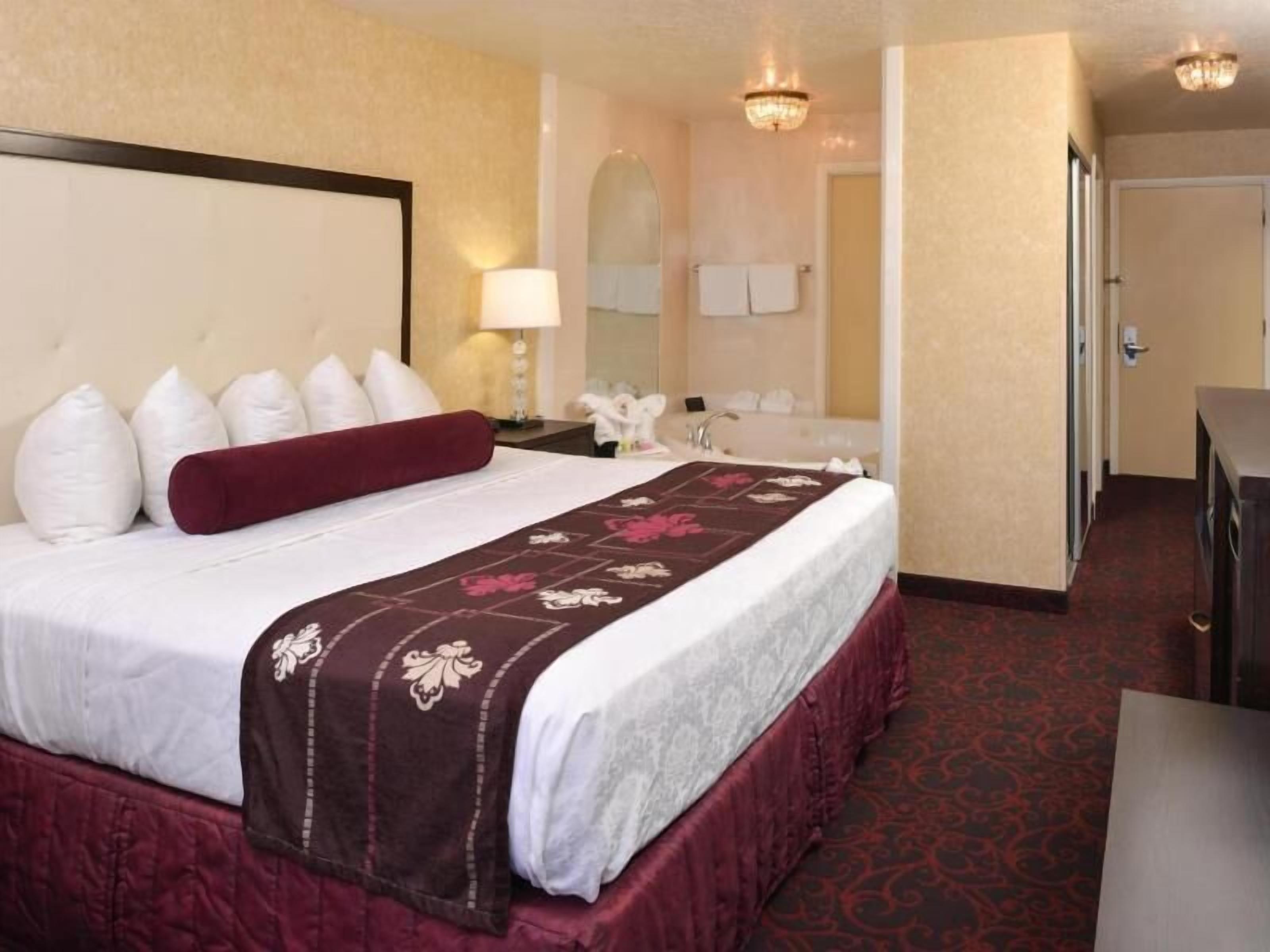 Pillowtop beds, desk, blackout drapes, iron/ironing board