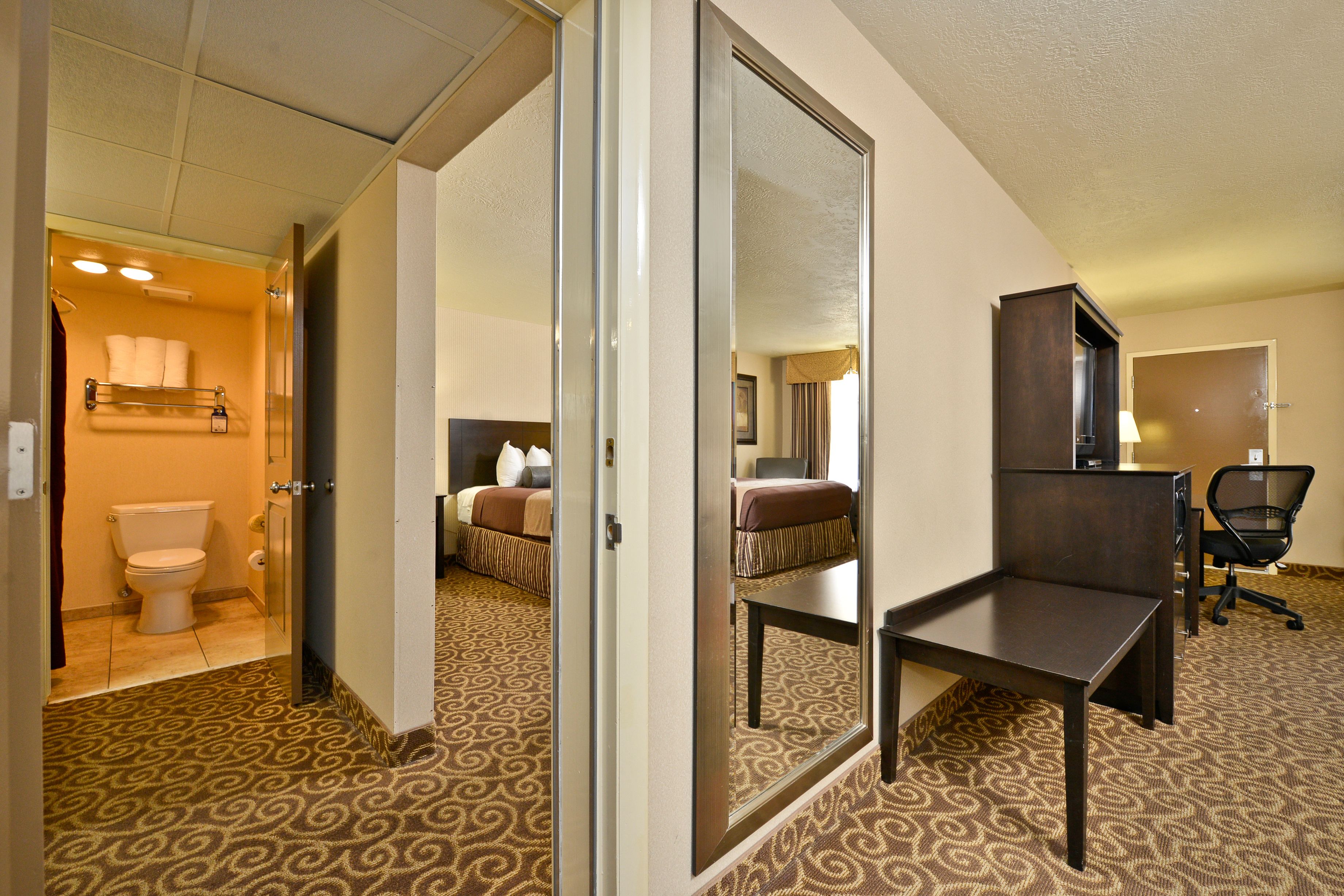 suite, 2 bedrooms, non smoking, refrigerator & microwave | bathroom | combined shower/bathtub, designer toiletries, hair dryer, towels