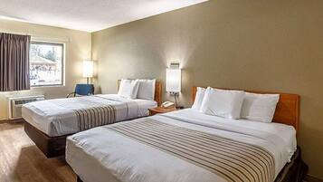 Hypo-allergenic bedding, down comforters, desk, blackout drapes