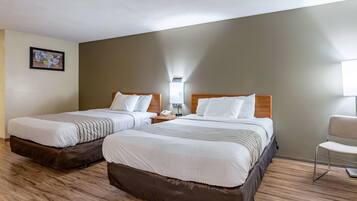 Hypo-allergenic bedding, down comforters, desk, blackout drapes