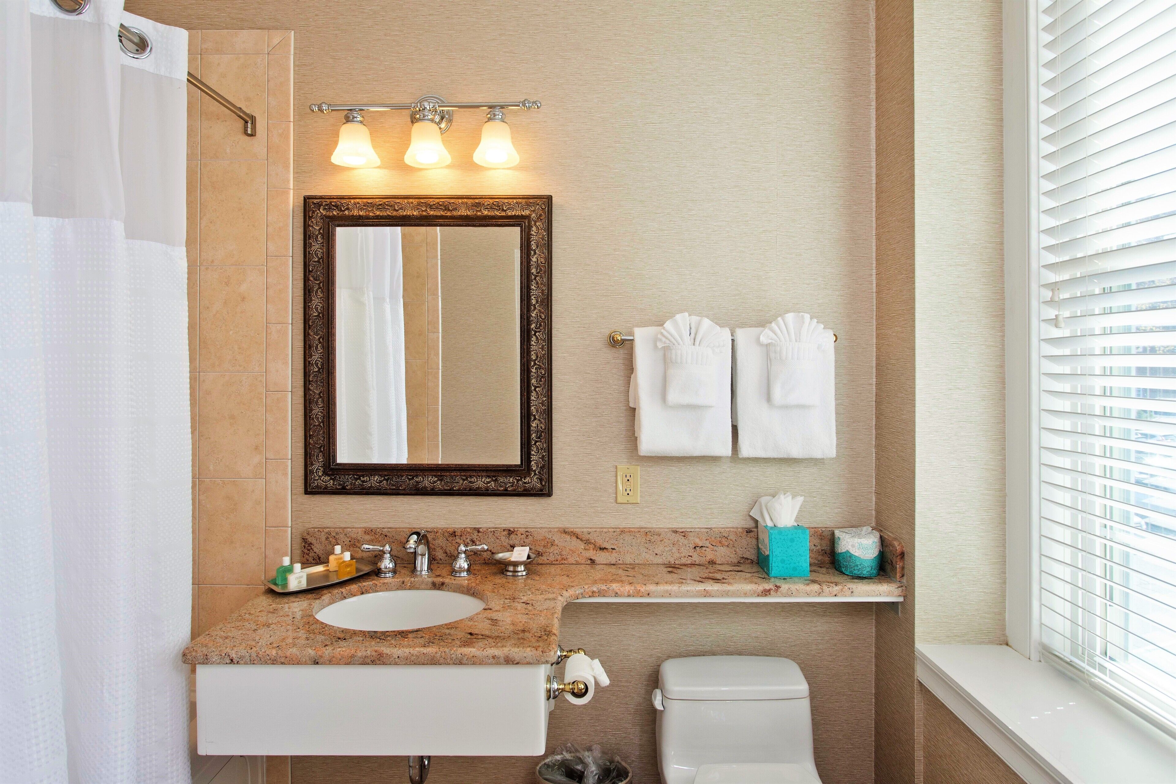 gothic garden queen | bathroom | combined shower/bathtub, designer toiletries, hair dryer, dressing gowns