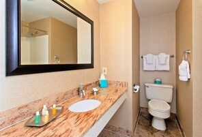 Balcony Queen | Bathroom | Combined shower/tub, designer toiletries, hair dryer, bathrobes