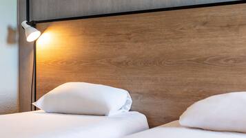 Desk, laptop workspace, free WiFi, bed sheets