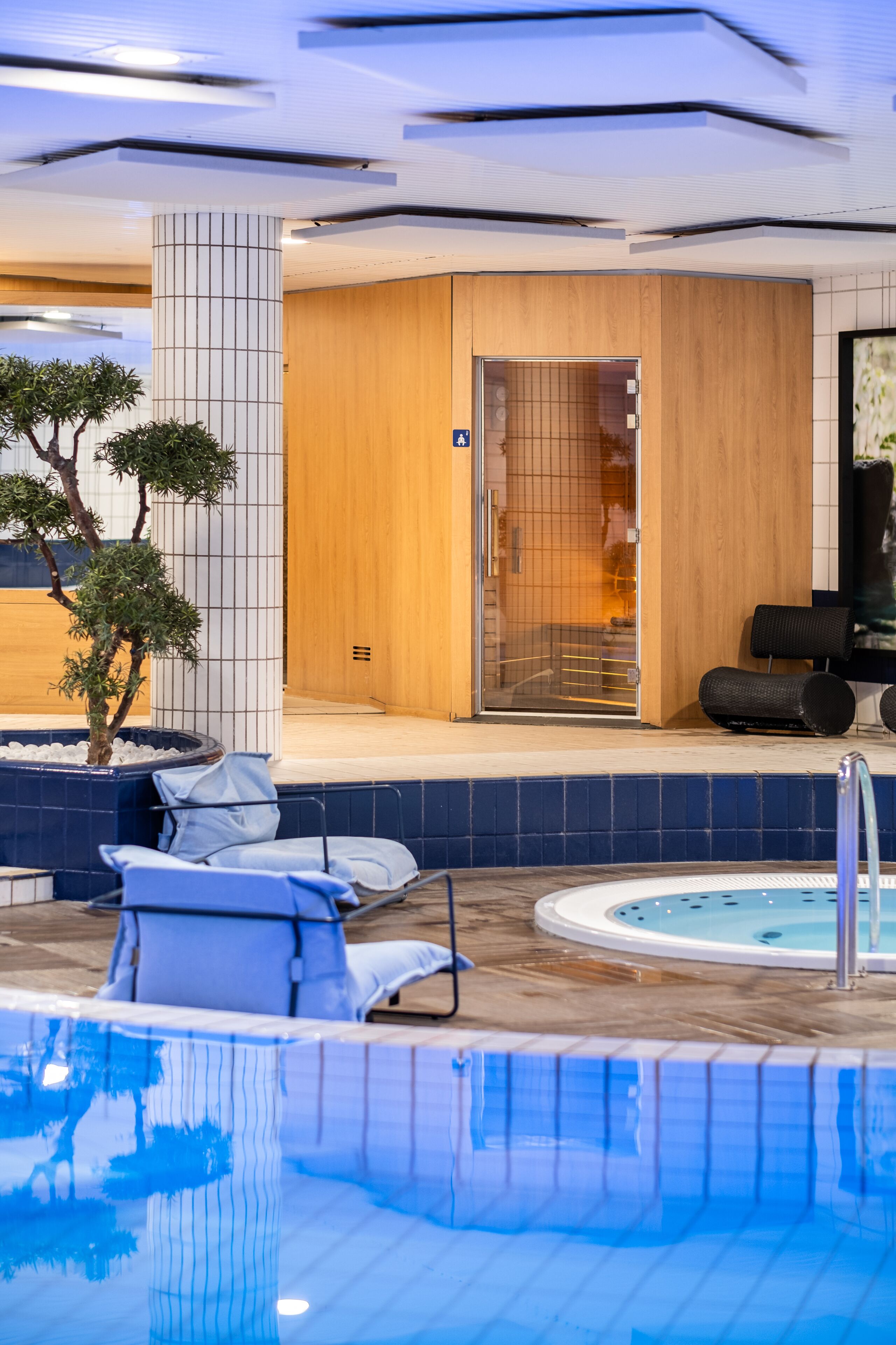 indoor pool, open 8:00 am to 9:00 pm, pool loungers