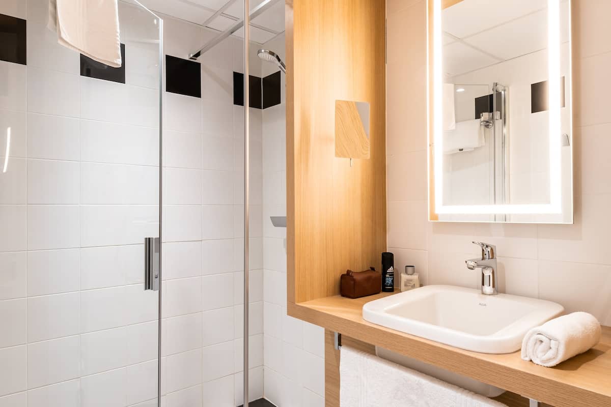 hair dryer, towels, soap, shampoo