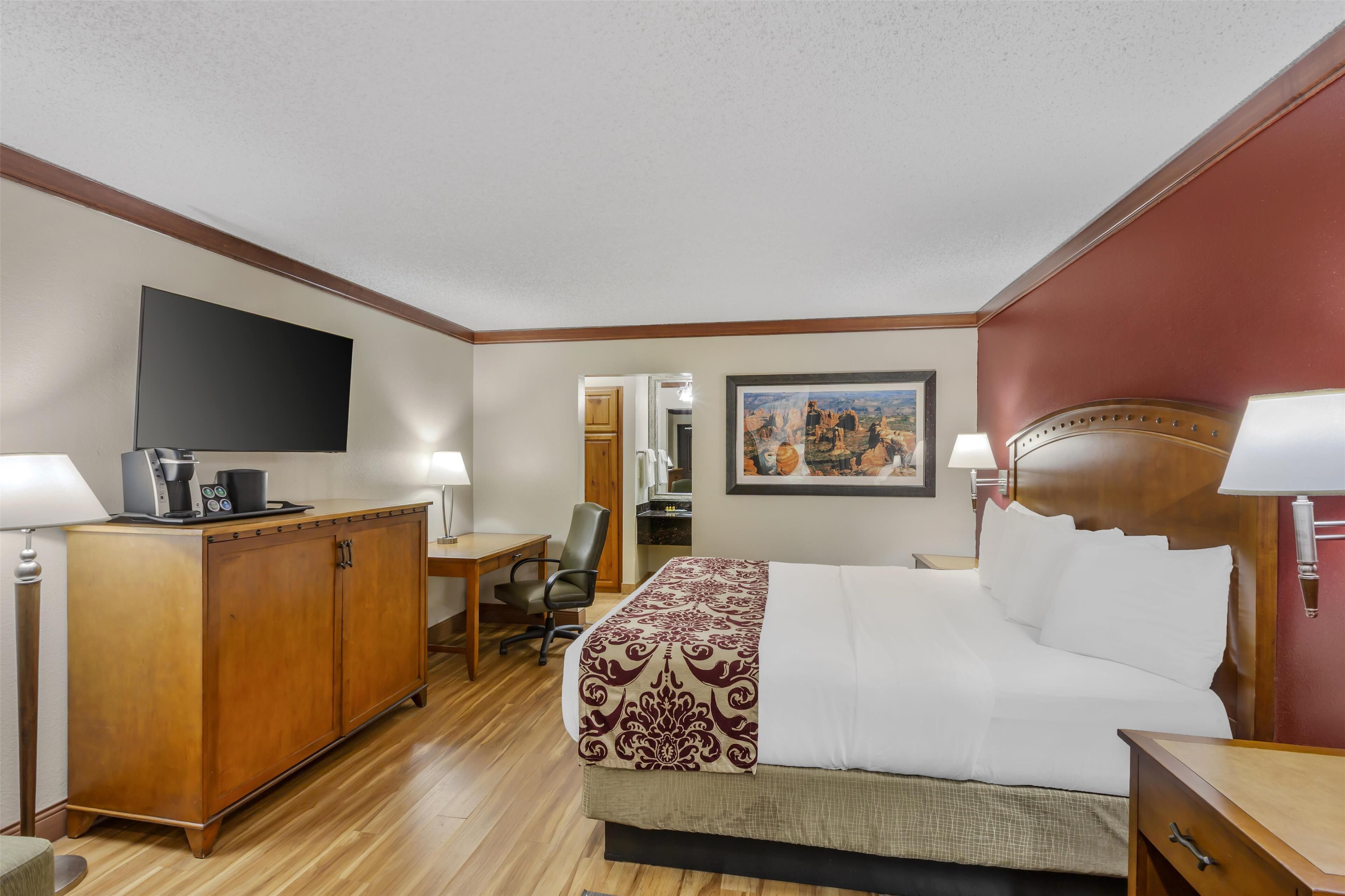 standard room, 1 king bed, non smoking, refrigerator | desk, blackout curtains, iron/ironing board, free cots/infant beds