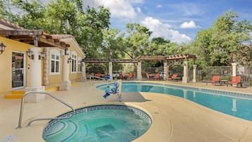 Seasonal outdoor pool, a heated pool, sun loungers