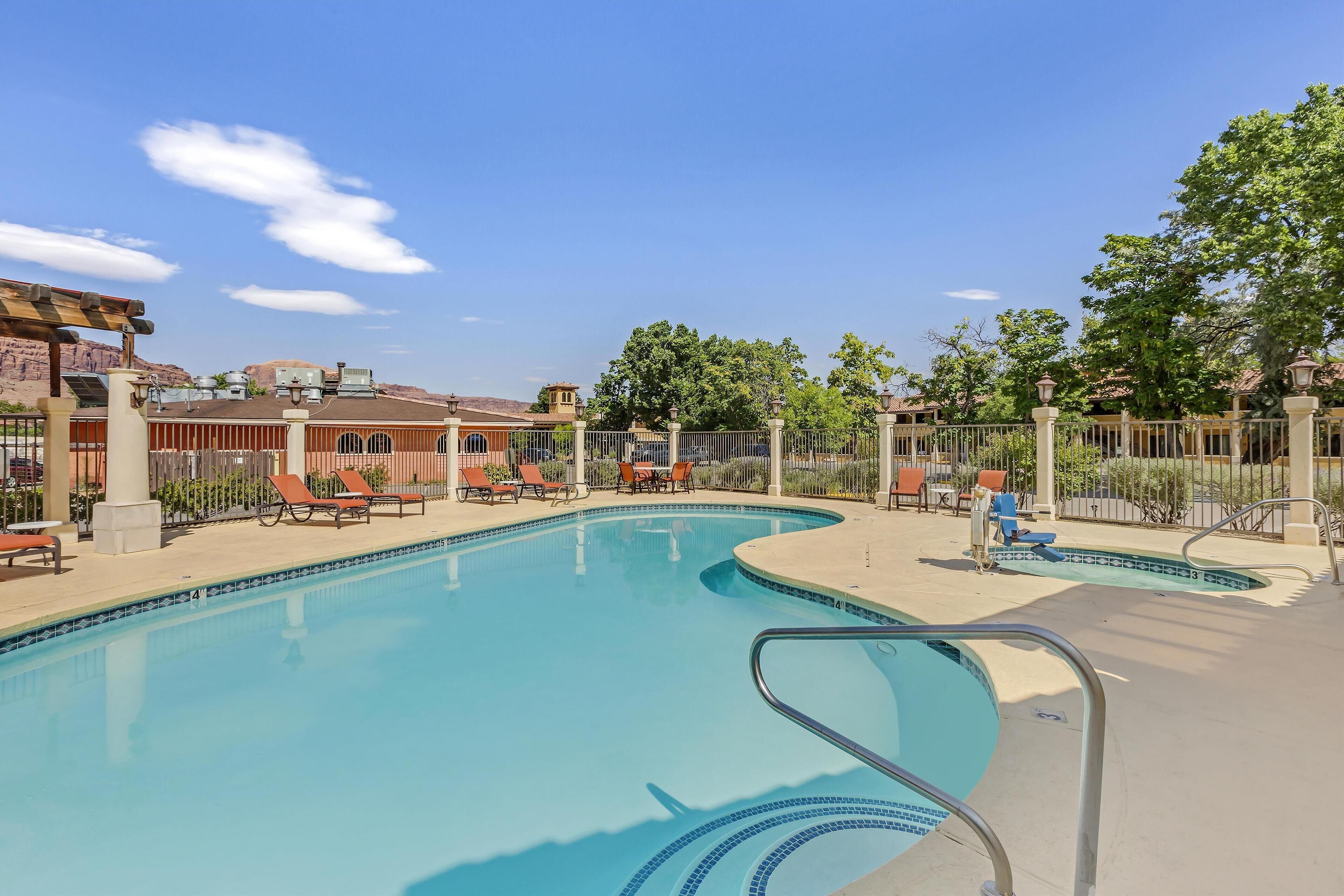 seasonal outdoor pool, a heated pool, pool loungers