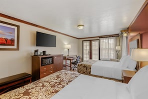 Down comforters, pillowtop beds, desk, blackout drapes