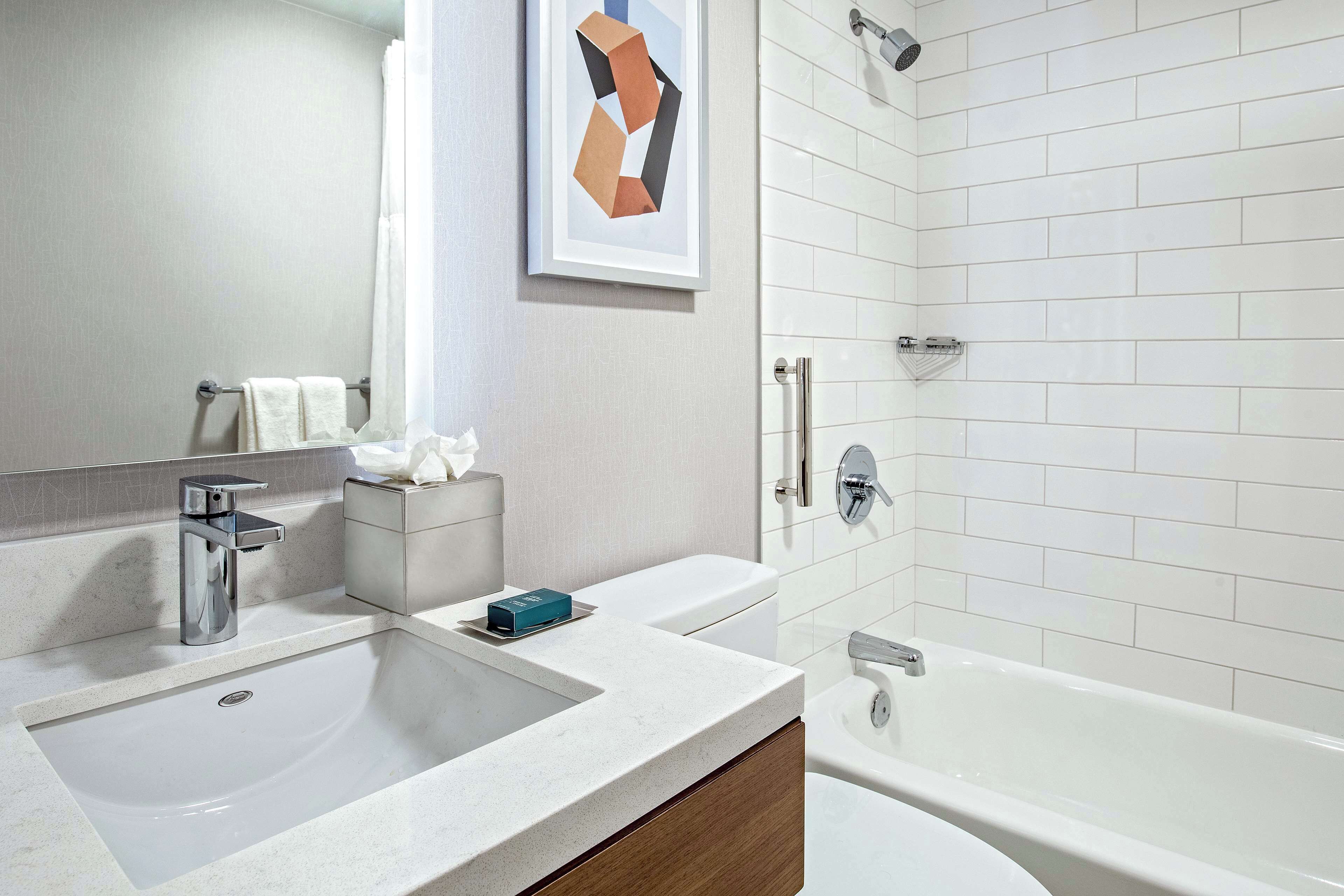 combined shower/bathtub, free toiletries, hair dryer, bathrobes