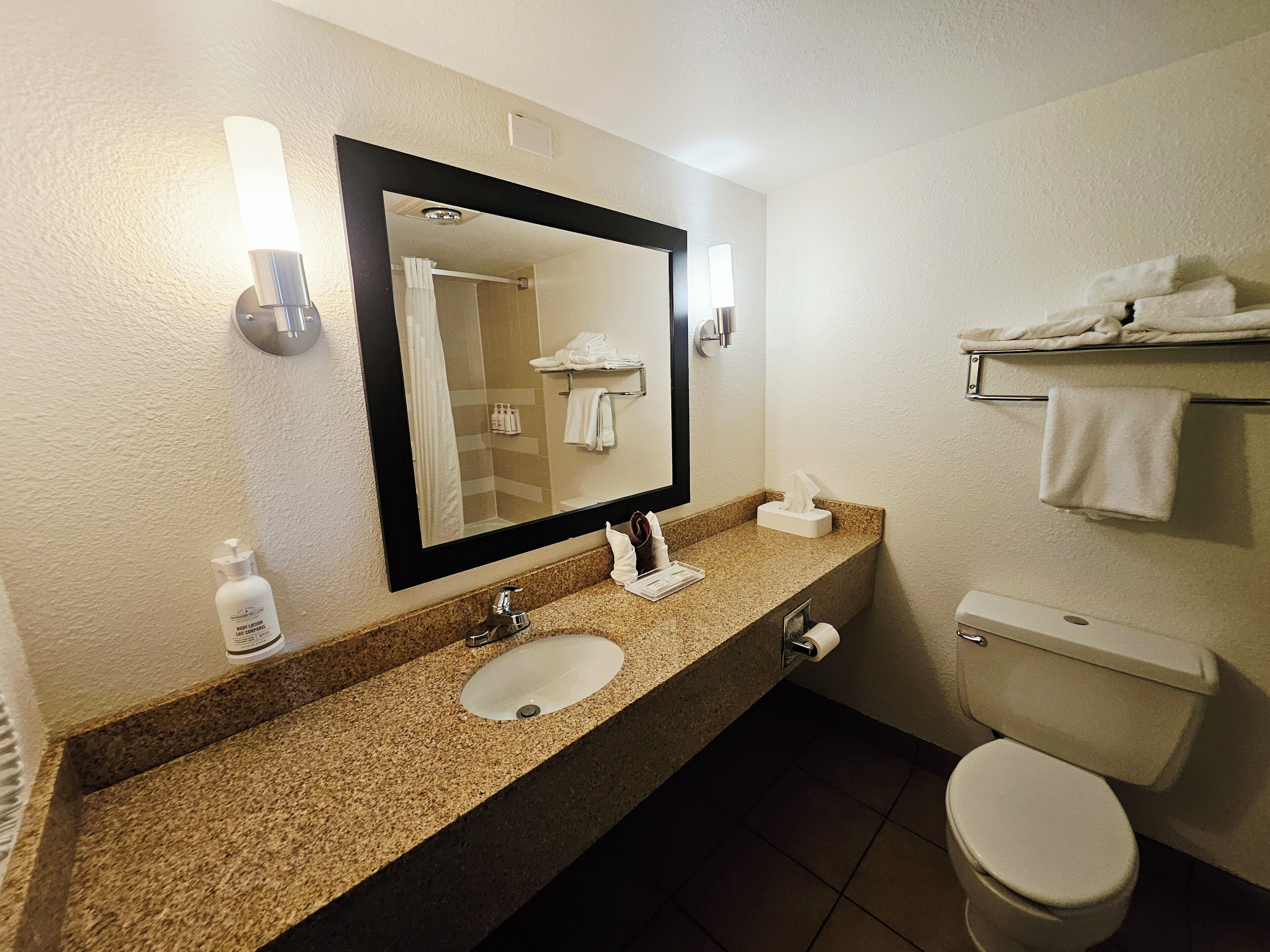 Junior Suite, 1 King Bed, Non Smoking | Bathroom | Combined shower/tub, hair dryer, towels