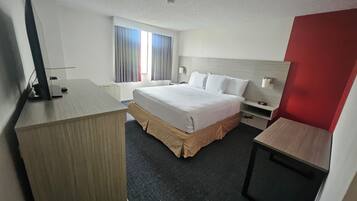 Suite familiar, varias camas, para no fumadores | Escritorio, espacio para trabajar con laptop y cortinas blackout