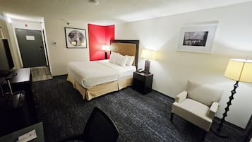 Desk, laptop workspace, blackout drapes, iron/ironing board