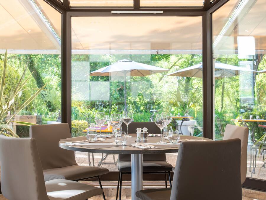 Breakfast, lunch, dinner served; French cuisine, garden views