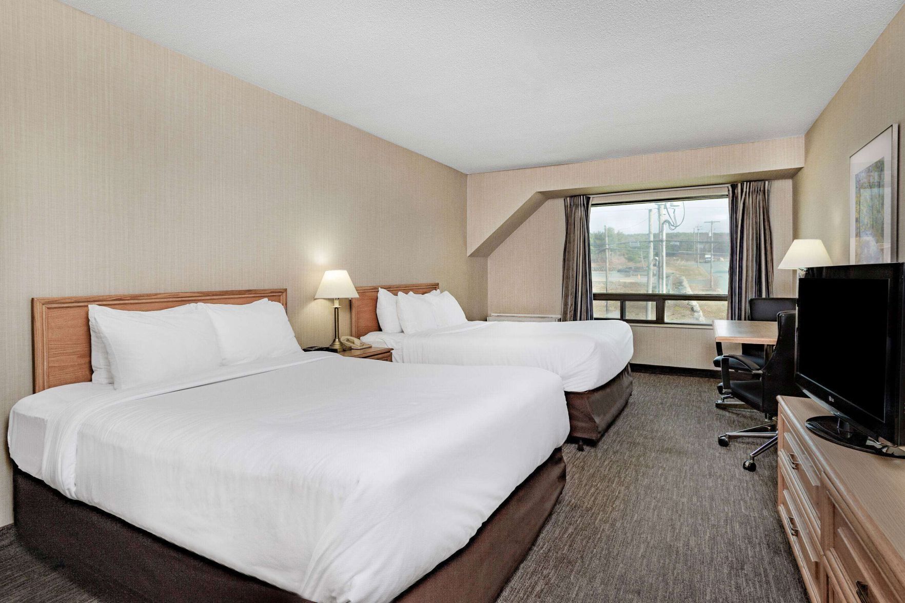 Ropa de cama de alta calidad y cortinas opacas