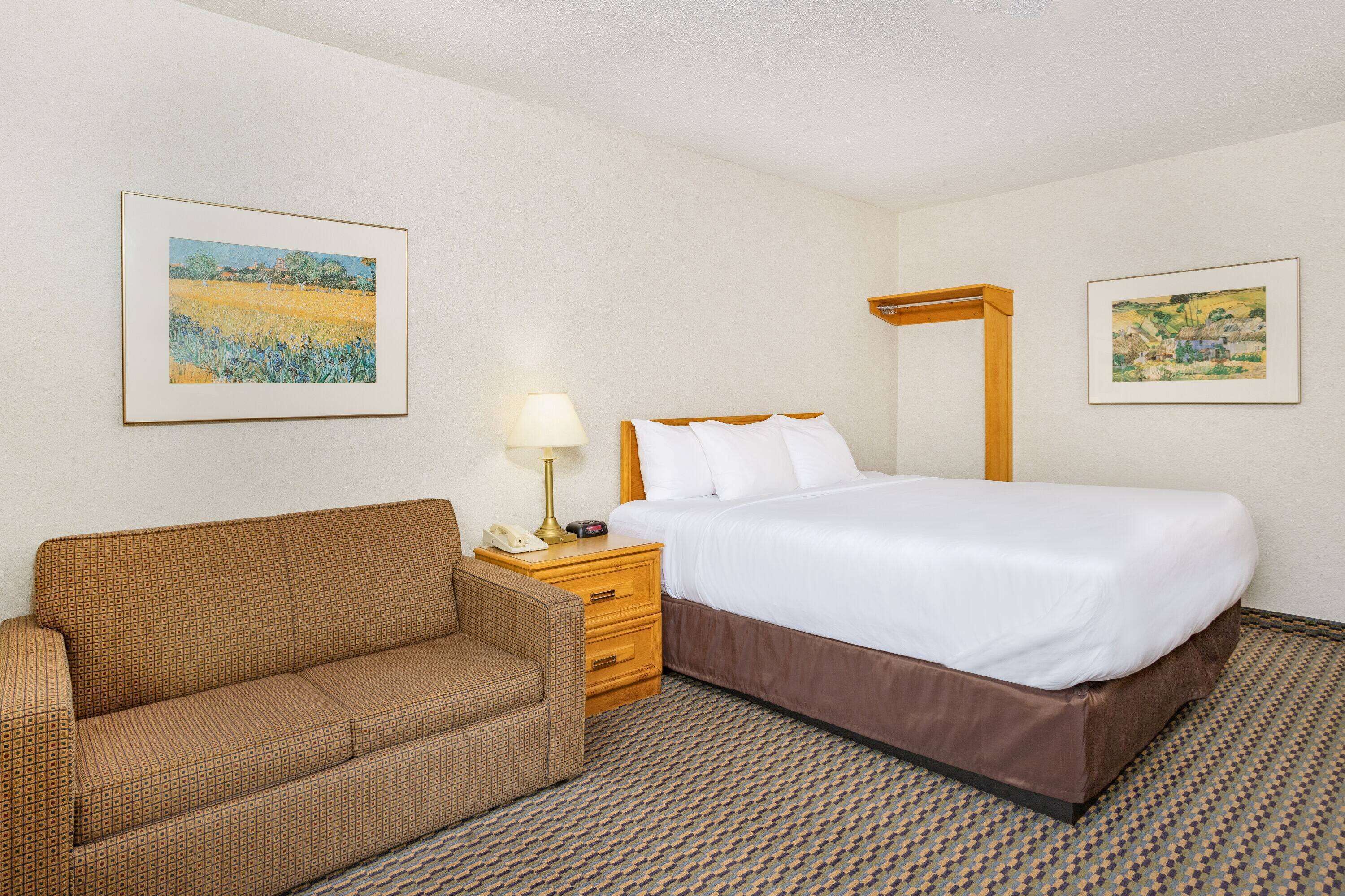 premium bedding, blackout curtains, iron/ironing board