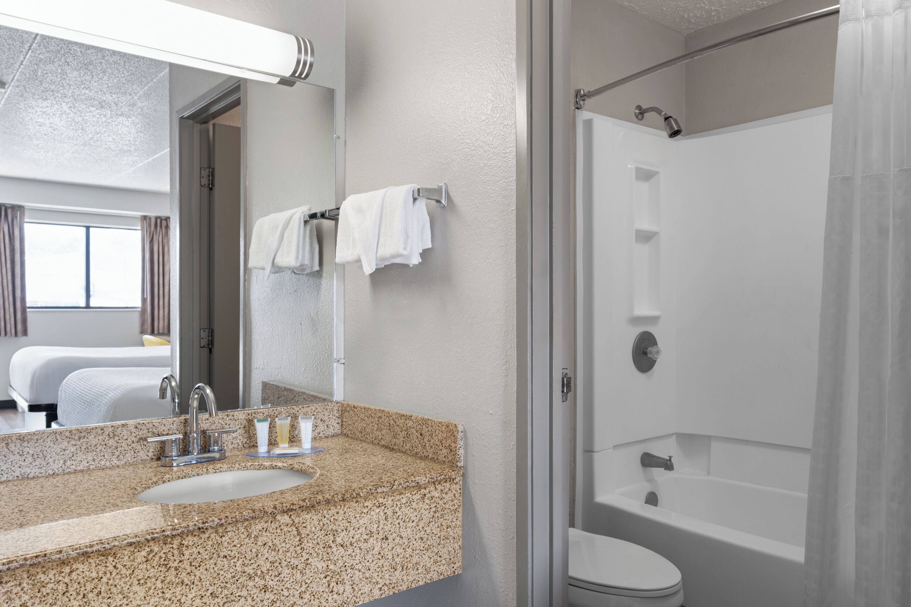 Room, 1 Queen Bed, Non Smoking | Bathroom | Combined shower/tub, free toiletries, hair dryer, towels