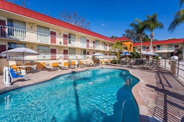 Outdoor pool, open 8:00 AM to 10:00 PM, pool loungers