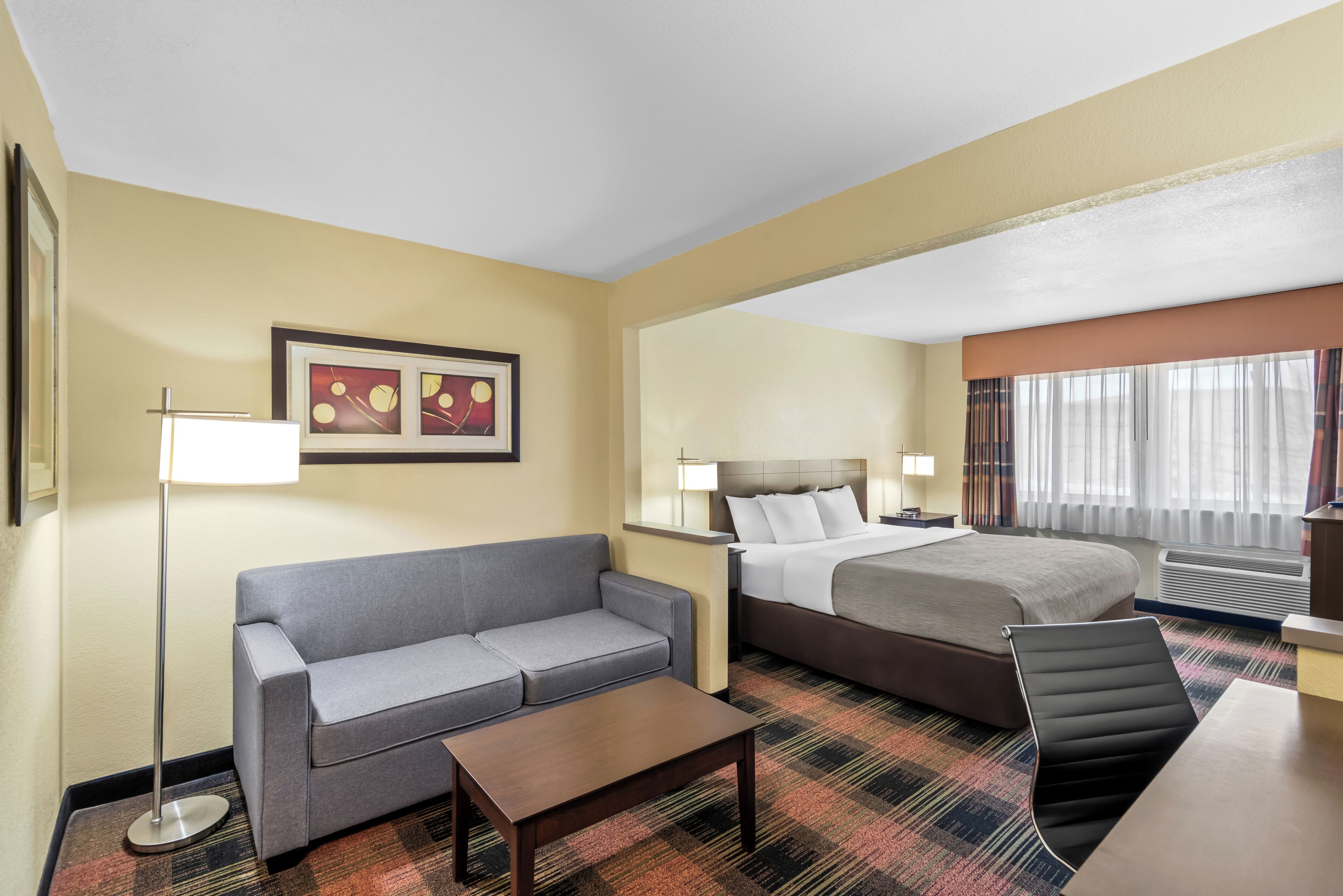Suite, 1 King Bed, Non Smoking | Hypo-allergenic bedding, desk, blackout drapes, soundproofing