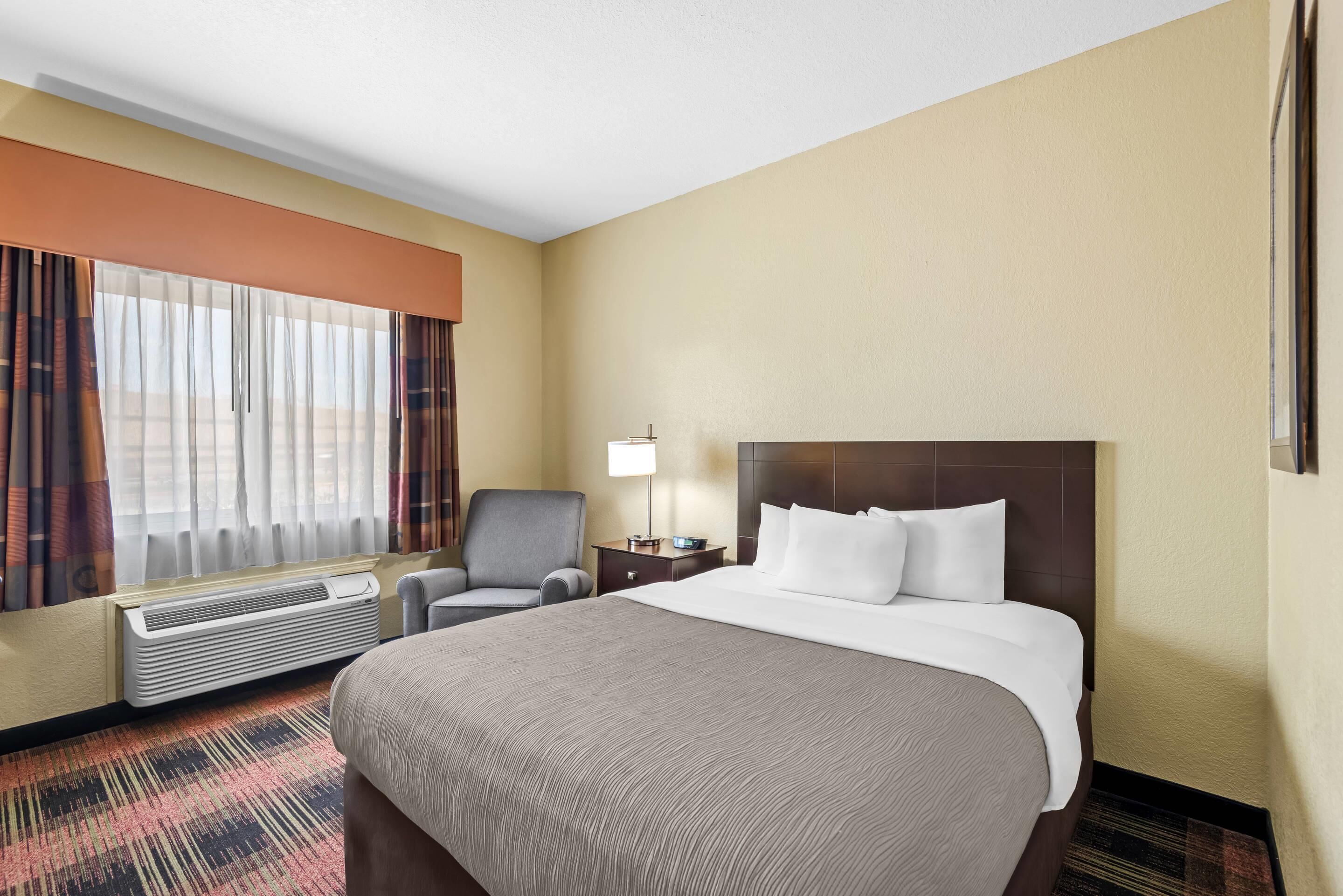 Hypo-allergenic bedding, desk, blackout drapes, soundproofing