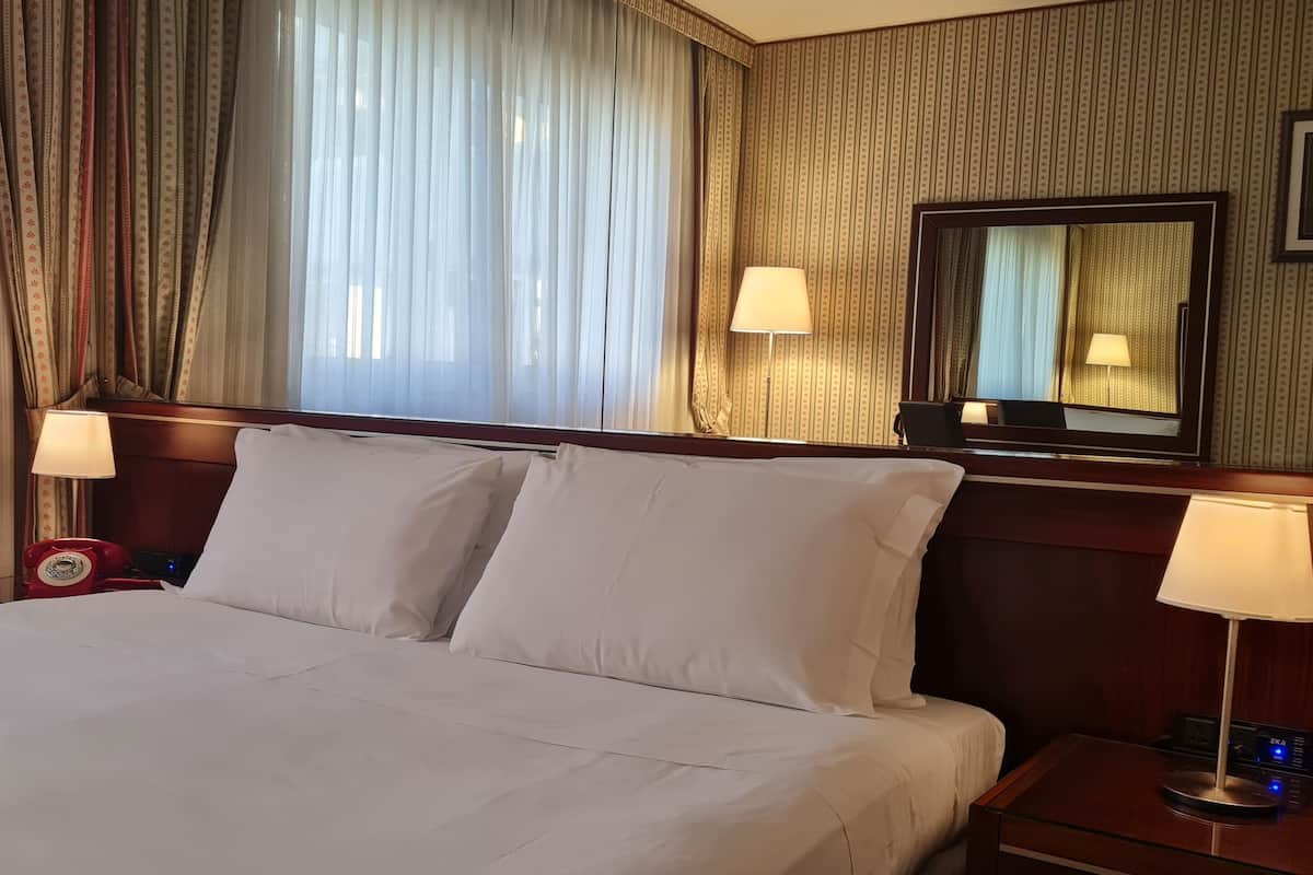 Triple Room | Down comforters, memory foam beds, minibar, in-room safe