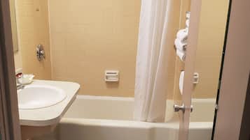 Bathtub, free toiletries, towels, soap