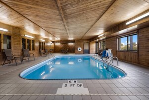 Indoor pool, open 7 AM to 10 PM, sun loungers