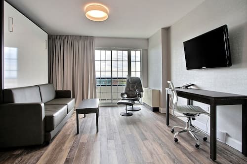 Suite, 1 Queen Bed with Sofa bed, Kitchenette | Desk, iron/ironing board, free WiFi, bed sheets