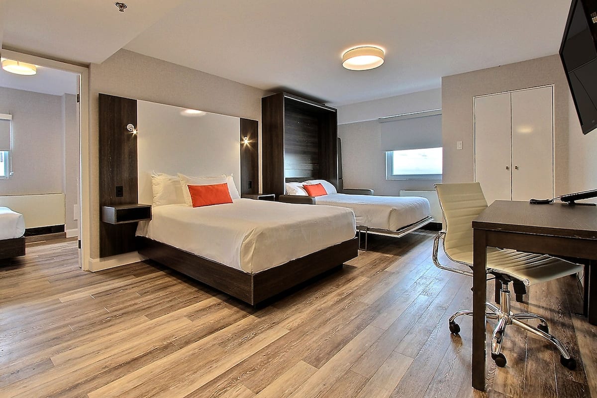 One-Bedroom Suite, 2 Queen Beds and 1 Murphy Bed | Desk, iron/ironing board, WiFi (free), bed sheets