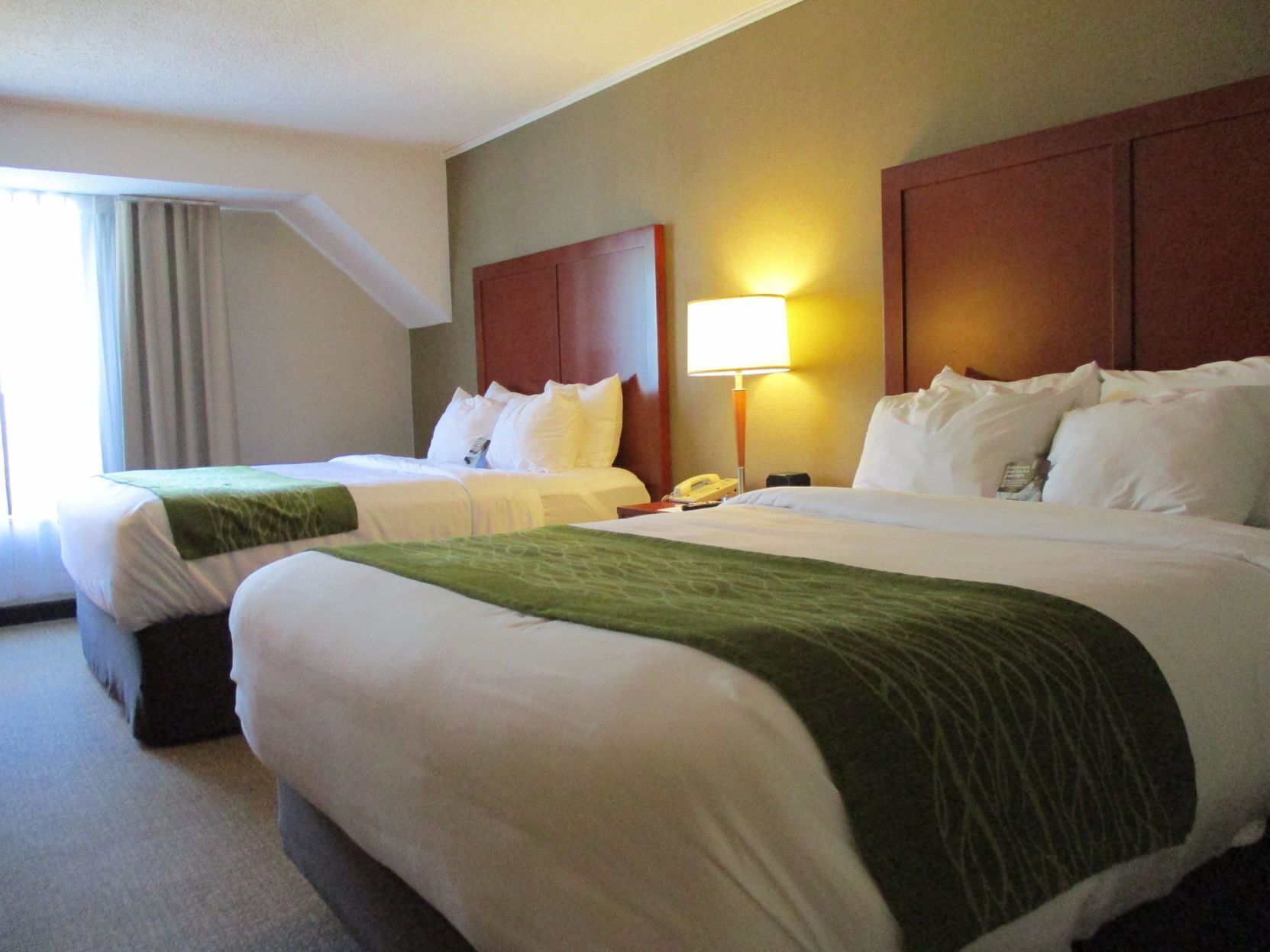 Premium bedding, individually furnished, desk, laptop workspace