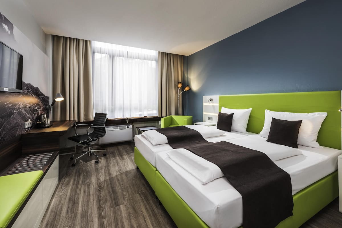 Chambre Standard, 2 lits une place | Literie de qualité supérieure, coffres-forts dans les chambres, bureau