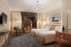 Ropa de cama de alta calidad y minibar 