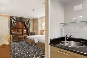 Roba de llit d'alta qualitat, minibar i caixa forta a l'habitació 