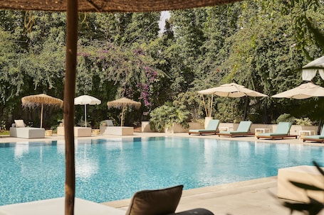 Outdoor pool, pool umbrellas, sun loungers