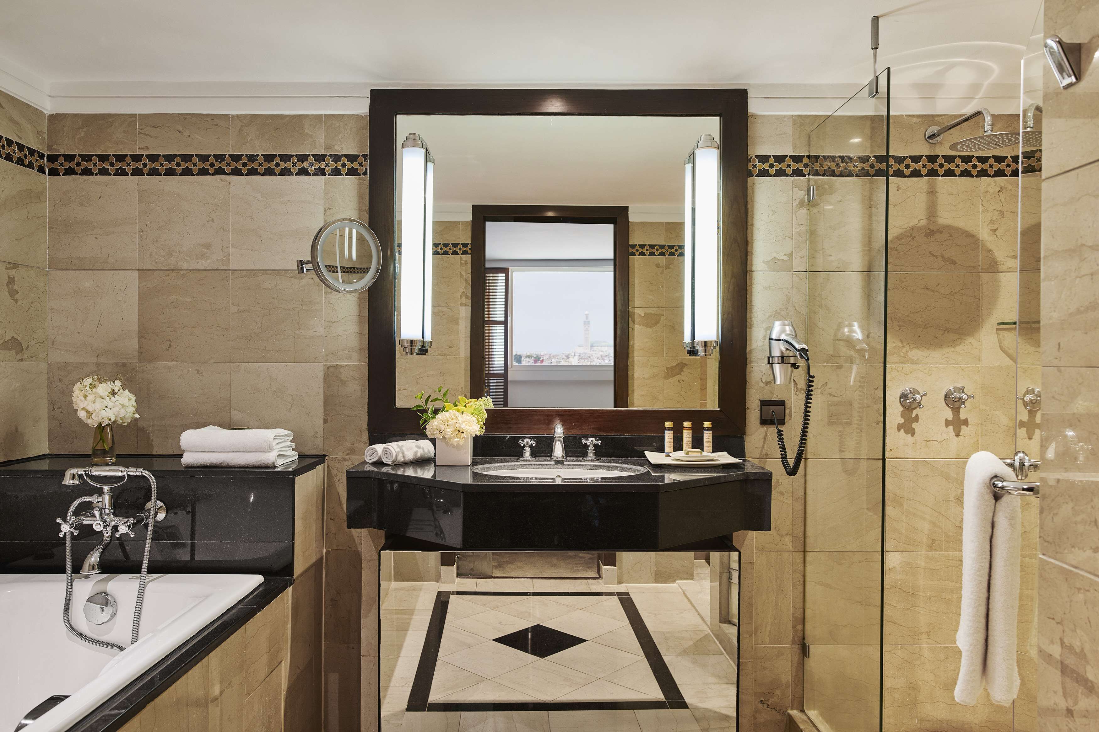 separate bathtub and shower, deep-soaking bathtub, rainfall showerhead