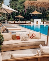 Outdoor pool, pool umbrellas, sun loungers