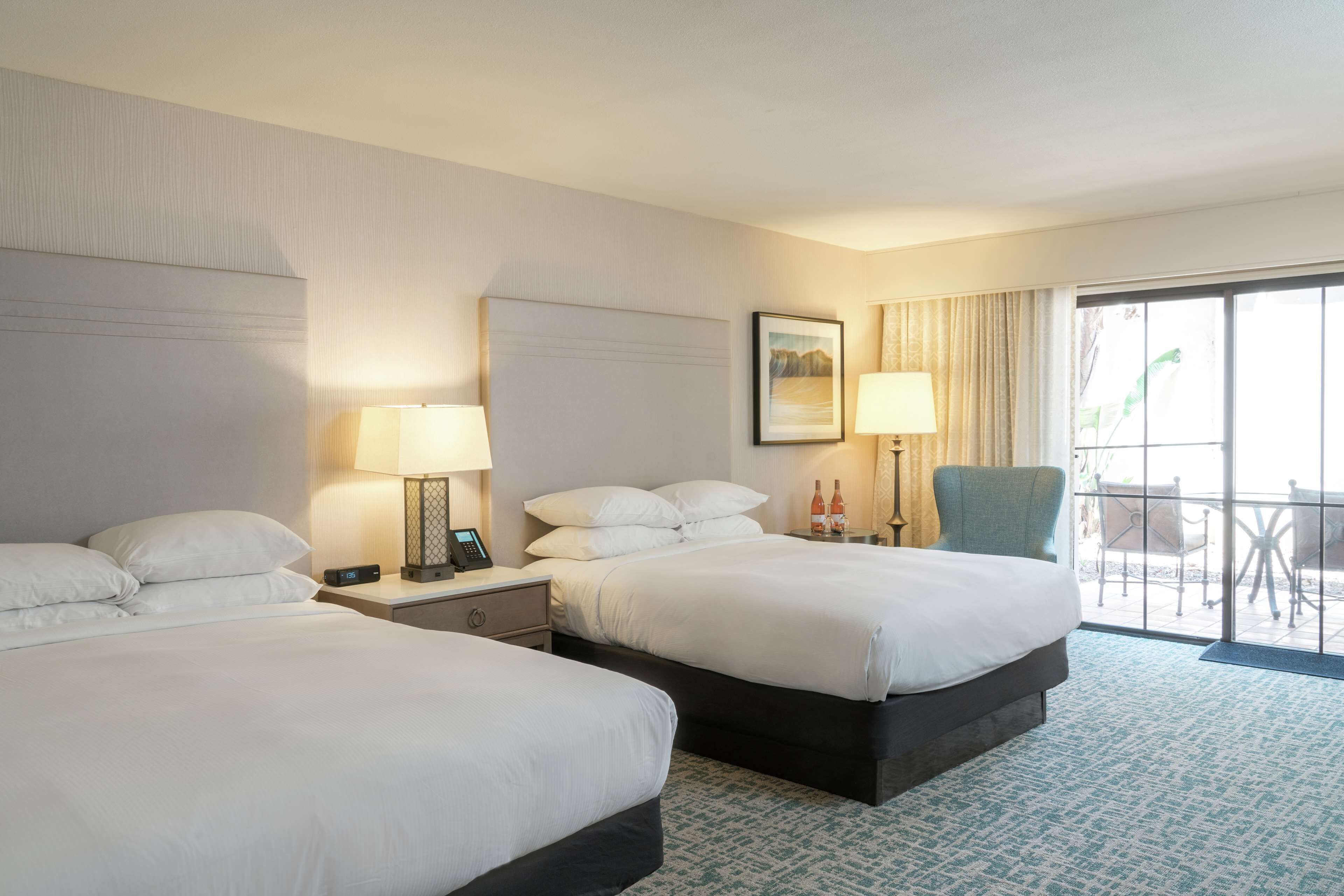 Premium bedding, down comforters, in-room safe, desk