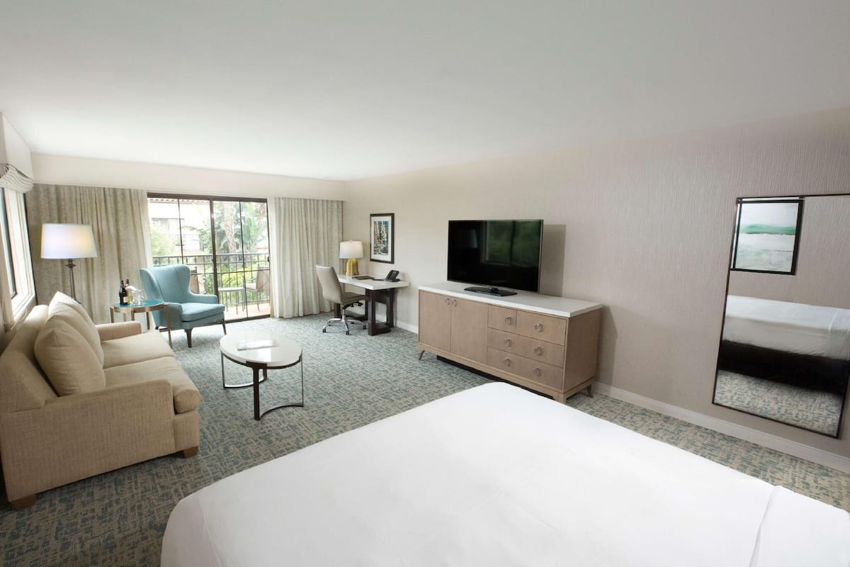 Premium bedding, down comforters, in-room safe, desk