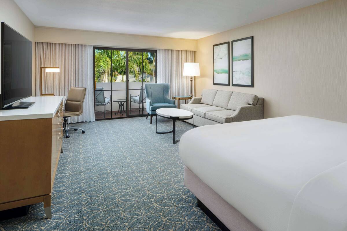 Premium bedding, down duvets, in-room safe, desk