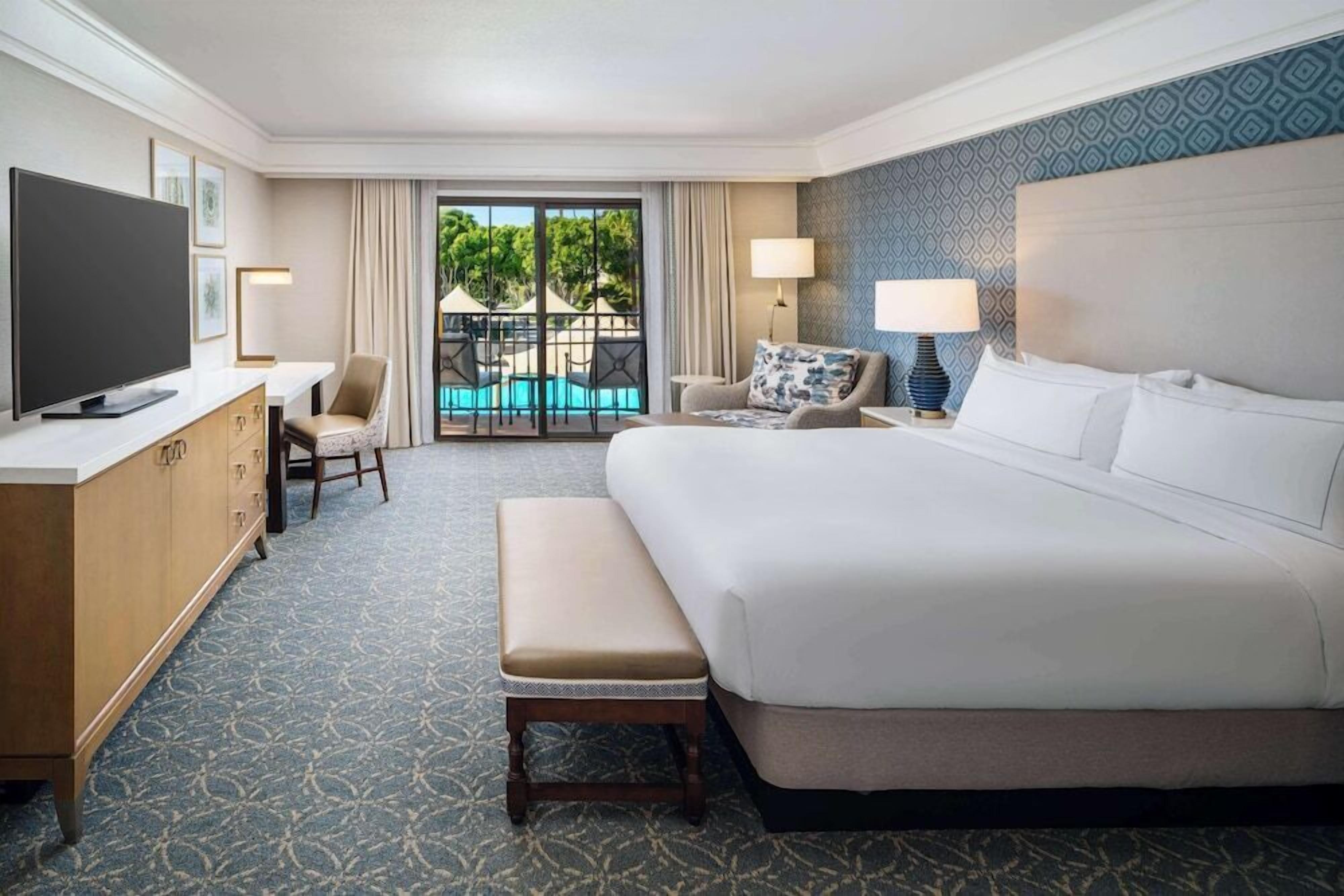 Premium bedding, down comforters, in-room safe, desk