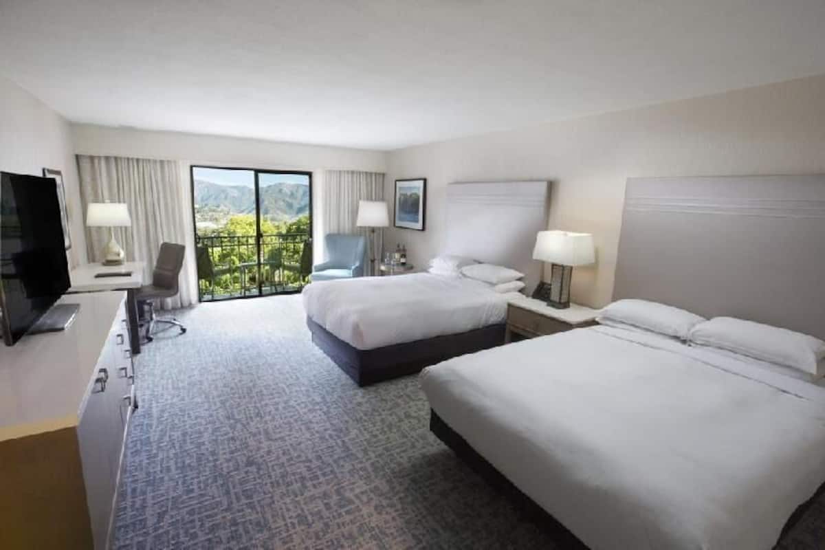 Premium bedding, down comforters, in-room safe, desk