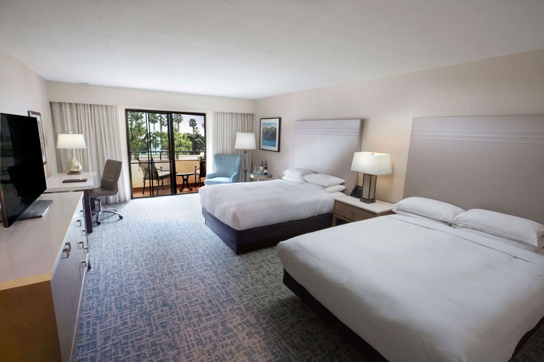 Premium bedding, down comforters, in-room safe, desk
