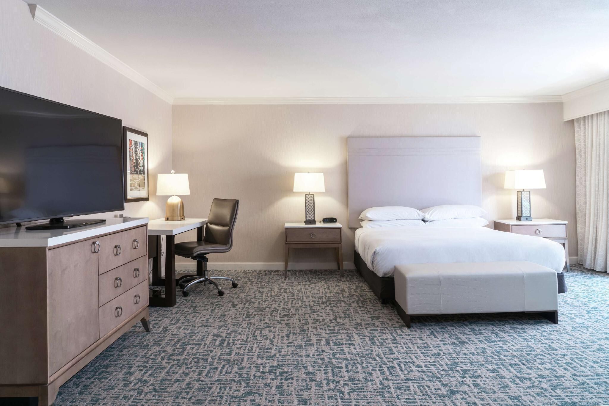 Premium bedding, down comforters, in-room safe, desk