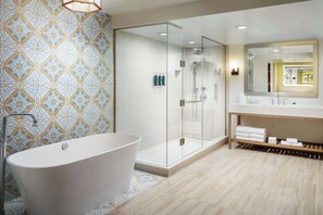 Designer toiletries, hair dryer, towels