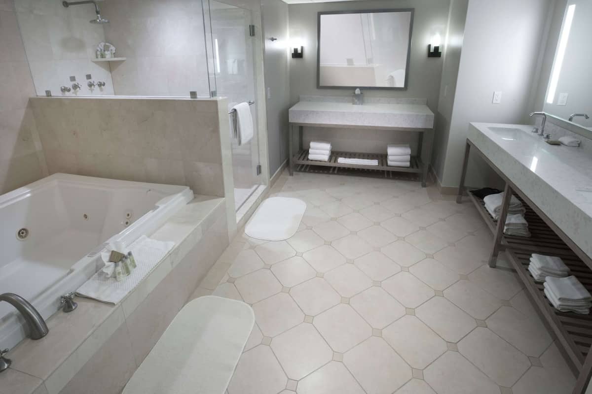 Bathroom | Designer toiletries, hair dryer, towels
