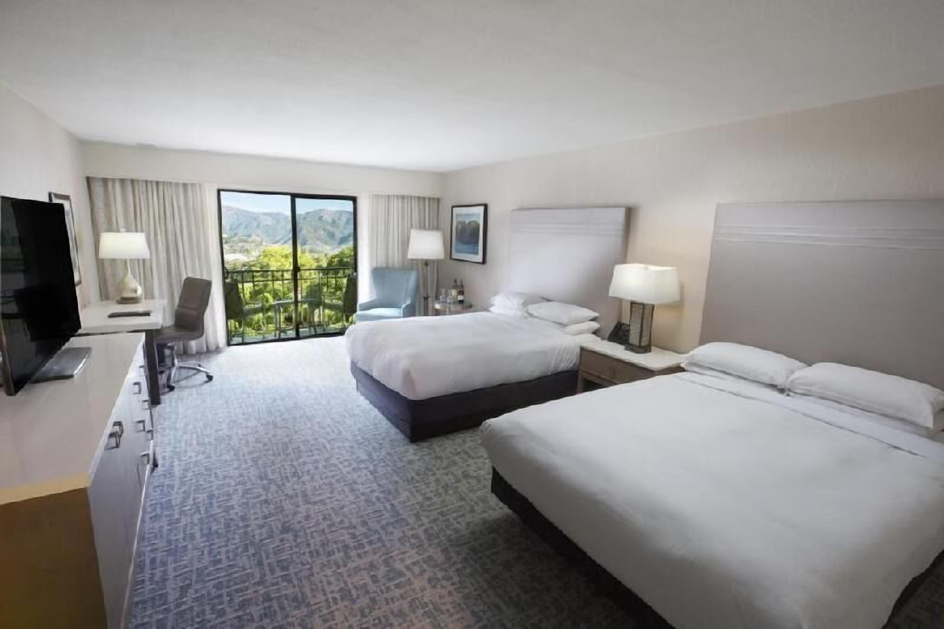 Premium bedding, down comforters, in-room safe, desk