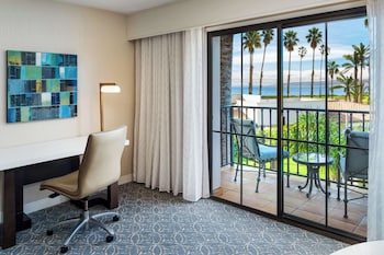 Premium bedding, down comforters, in-room safe, desk at Hilton Santa Barbara Beachfront Resort