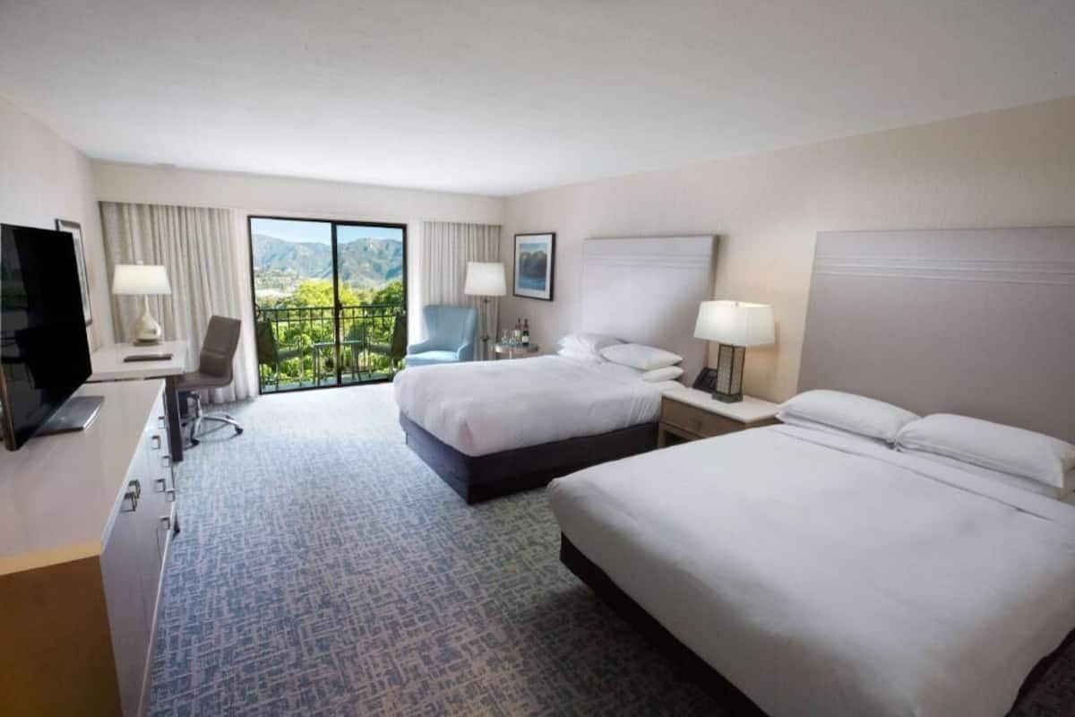 Premium bedding, down comforters, in-room safe, desk