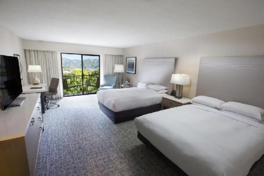 Premium bedding, down comforters, in-room safe, desk
